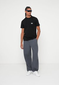Rip Curl UNISEX czarny