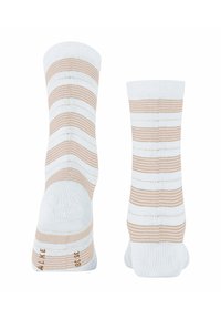 Gestreifte Socken aus Wolle mit horizontalen beigen und weißen Streifen, weichem Material, elastischen Bündchen sowie verstärkter Zehen- und Fersenpartie für zusätzliche Haltbarkeit.