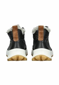 Schwarze Lederstiefeletten mit Fellakzenten, braunen Wildlederschaftblenden und einer weißen Zwischensohle. Gummisohle mit strukturiertem Profil.