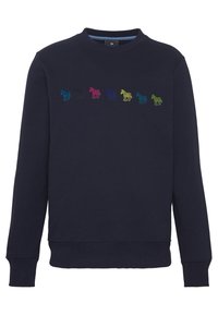 Granatowa bluza z okrągłym dekoltem z rzędem siedmiu małych, haftowanych zeberek w ró�żnych jasnych kolorach na piersi.