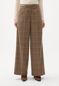 Bruine geruite broek van textuurstof, met een wijdvallend ontwerp, twee zijzakken en een op maat gemaakte taille.