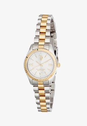 Orologio da polso in metallo bicolore argento e oro con quadrante bianco, numeri romani dorati alle posizioni 3, 6, 9 e logo a ore 12.