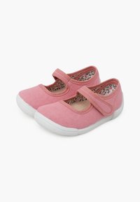 Pink canvas shoes with a Velcro strap. Rounded toe design and white rubber sole. Floral-patterned lining inside. Smooth texture.
