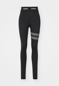 Leggings atletici neri con vita alta, caratterizzati da strisce di rete decorativa sul lato sinistro e una texture liscia e elastica.