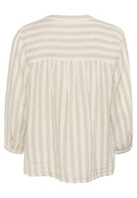 Linen blouse with light cream and beige stripes, relaxed fit, three-quarter sleeves, gathered back, round neckline, and buttoned cuff.
