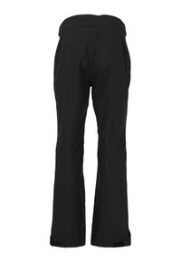 Pantalons de ski noirs à taille haute, coupe droite, et avec des sangles de maintien aux chevilles. Fabriqués en tissu lisse et durable avec des coutures minimales.