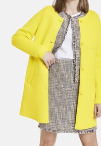 Taifun Abrigo corto - yellow