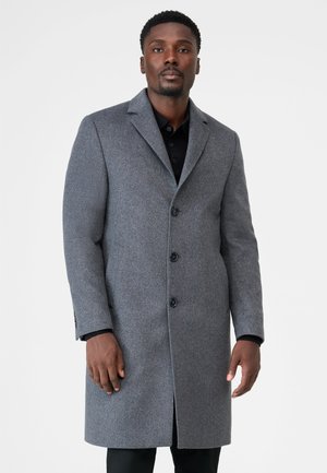 Grijze wolmix jas met een getailleerde pasvorm, drie knopen, reverskraag en zijzakken. Geweven stof en een knie-lange uitvoering.