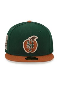Green cap with a brown visor, featuring an embroidered peach logo with "NY" letters in white and green. Side patch displays additional graphic details.