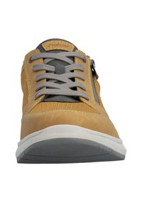 Tan casual shoes with a leather and mesh design, gray laces, a side zipper, and a textured white rubber sole.