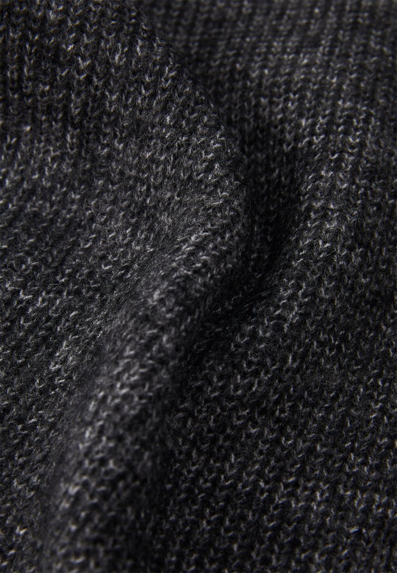 Knitted fabric in dark gray with a soft texture, featuring a subtle variegated pattern and a slightly raised stitch design.