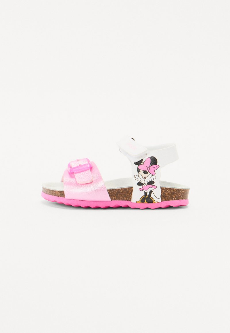 Sandalias infantiles en rosa y blanco con una correa brillante, hebilla ajustable, plantilla de corcho y un diseño impreso de Minnie Mouse en el lateral.