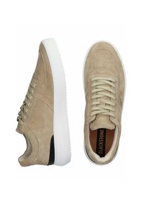 Beige suede sneakers with white rubber soles, round toe, and tonal laces. Features perforated detailing and a black heel accent.