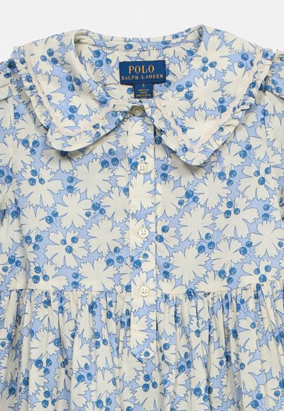 Παιδικό μπλε και λευκό φόρεμα με λουλουδάτο μοτίβο, με γιακά με βολάν, κούμπωμα με κουμπιά μπροστά και ετικέτα Polo Ralph Lauren στο εσωτερικό του λαιμού.
