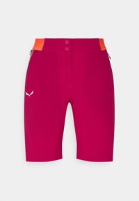 Fuchsian atletiska shorts med en texturerad orange midja, två knappar och en vit logotypaccent på vänster ben.