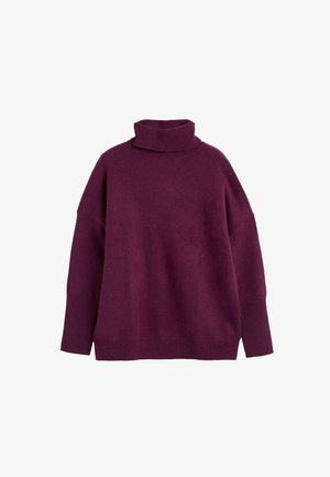 Bordeaux coltrui gemaakt van zacht breigoed, met verlaagde schouders en geribbelde manchetten voor extra textuur.