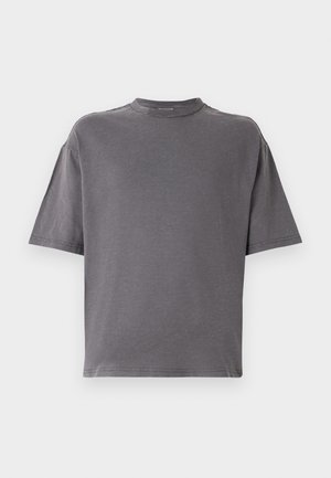T-shirt à manches courtes et col rond en mélange de coton gris foncé. Présente une coupe décontractée et un design simple, sans ornements, avec des bords cousus.