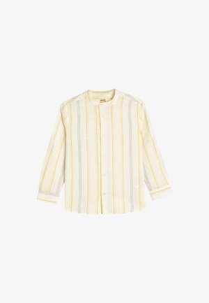 Camisa ligera de manga larga en crema con rayas verticales grises y amarillas. Presenta un cuello mao y cierre frontal con botones.