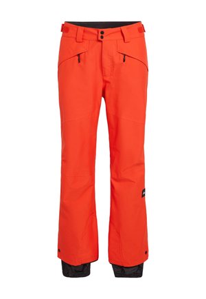 Pantalones de nieve impermeables de un brillante color naranja, con corte recto, cinturilla ajustable y detalles en negro en los puños y los bolsillos.
