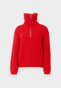 Rode gebreide pullover met een hoge kraag en een halve rits aan de voorkant. Getextureerde fleece stof en geribbelde manchetten, met een losse pasvorm.