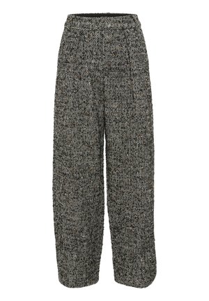 Weite Hose im schwarz-weißen Hahnentritt-Muster, mit strukturiertem Gewebe, Falten und einem hohen elastischen Bund.