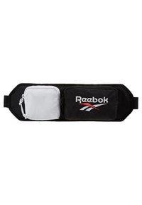 Sac banane noir et blanc avec deux compartiments zippés, l'un orné du logo Reebok en lettres blanches et rouges.