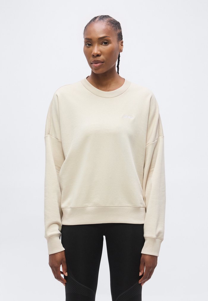 adidas SEASONAL ESSENTIALS COLORPOP WITH EMBROIDERED GRAPHIC - Sudadera - beige/frozen purple