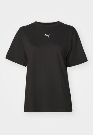 T-shirt en coton noir avec col rond, manches courtes et logo Puma blanc sur la poitrine. Texture lisse, coupe décontractée.