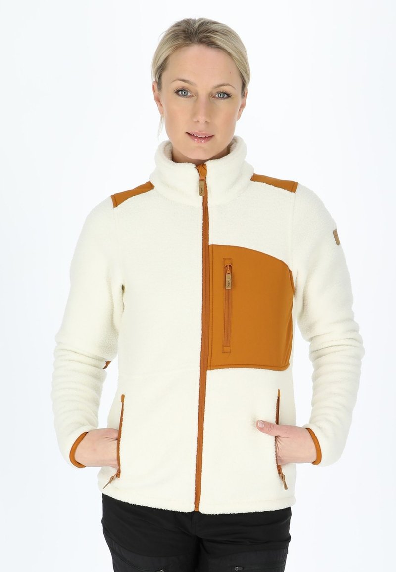 Fleece jacket in cream with a brown chest panel and zip pocket; features snug collar, two side pockets, and ribbed cuffs.