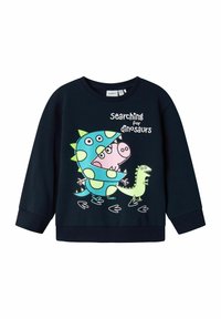Felpa navy con grafica a tema dinosauri in blu, verde e rosa con il testo "Cercando dinosauri" e polsini a coste.