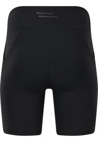 Zwarte sportshorts met een aansluitend ontwerp, naadloze constructie en een zachte textuur. Beschikt over twee zijzakken en reflecterende details.