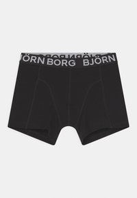 Sorte bomullsbokser med en tettsittende fasong, med en kontrastfylt svart og hvit elastisk midje med "BJÖRN BORG" tekst.