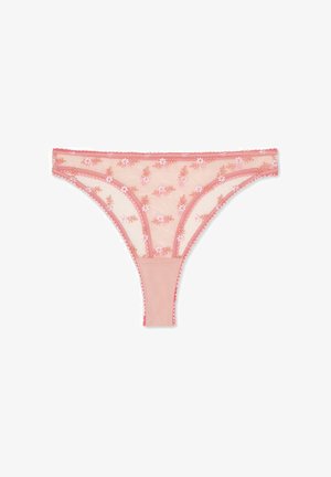 String rose brodé en tulle transparent avec des motifs floraux. Il dispose d'une taille lisse et d'un ourlet avec des détails en feston.