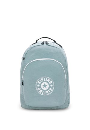 Light blue backpack with a textured finish, featuring a rounded shape, zip closures, and a circular white logo on the front.