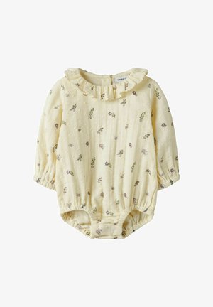 Krém színű, hosszú ujjú babaoverál fodros gallérral és apró lila és zöld virágmintával, elasztikus mandzsettákkal és lábnyílásokkal.