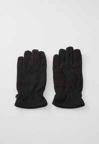 Gants en polaire noire avec une finition texturée, dotés de poignets élastiques et d'un logo subtil embossé au niveau du poignet. Design de doigts notable pour une dextérité optimale.