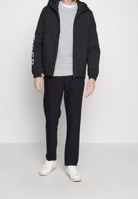 Tommy Hilfiger Übergangsjacke - black