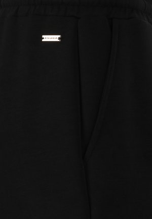 Athlecia, SWEATPANTS JACEY - Pantalones deportivos - black