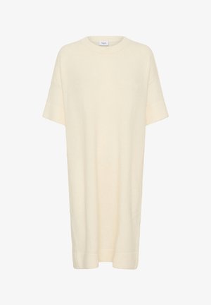 Cream-colored, short-sleeve, knee-length knit dress with ribbed cuffs and hem, round neckline, and a Saint label at the collar.