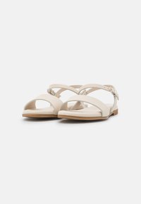 Tamaris Sandaalit nilkkaremmillä - off-white