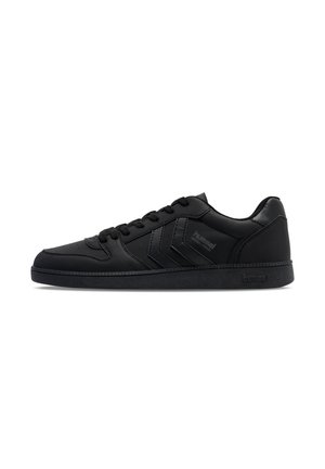 Black athletic sneakers with a smooth synthetic leather upper, lace-up design, textured rubber sole, and three diagonal stripe accents.