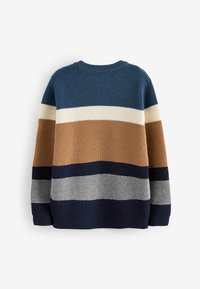 Randig tröja i marinblå, brun, krämfärgad och grå. Vaffelstickad textur, rund halsringning och långa ärmar. Avslappnad design med ribbad avslut.