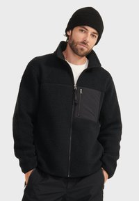 Aigle Giacca in pile - black