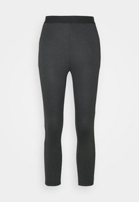 Svarta leggings med ett texturerat rutmönster, med en medelhög elastisk midja och en tapered passform med hela ben.