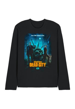 Schwarzes Langarmshirt mit dem Motiv "Walking Dead Dead City", das zwei bewaffnete Charaktere und einen zerbrochenen Kopf der Freiheitsstatue in einer dunklen Stadtsilhouette zeigt.