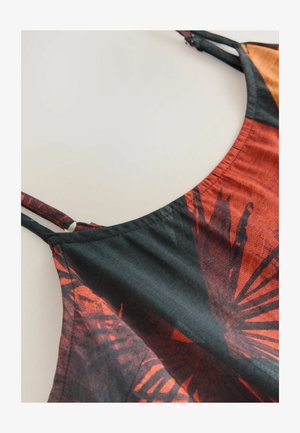 Ärmelloses Kleid mit einem schwarzen und roten Palmenblattmuster, glattem Stoff und einem runden Ausschnitt. Verstellbare Träger.
