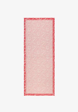 Pink fabric with a textured pattern, edged with a bold red border featuring a floral design and white accents. Rectangular shape, smooth texture.