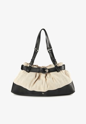 Schwarze Lederriemen und Basis mit beigem Leinenbeutel-Körper. Verfügt über einen Lederakzentgürtel mit einer runden Metall-Schnalle.