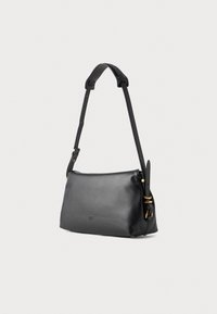 Black leather shoulder bag with a smooth texture, adjustable strap, and gold-tone hardware accents. Rounded shape with minimalistic design.