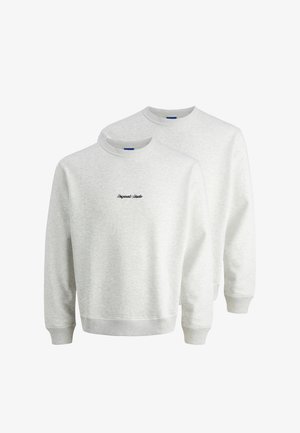 Light gray sweatshirts with crew necklines, ribbed cuffs, and waistband. Black "Original Studio" text on the chest. Soft fabric texture.